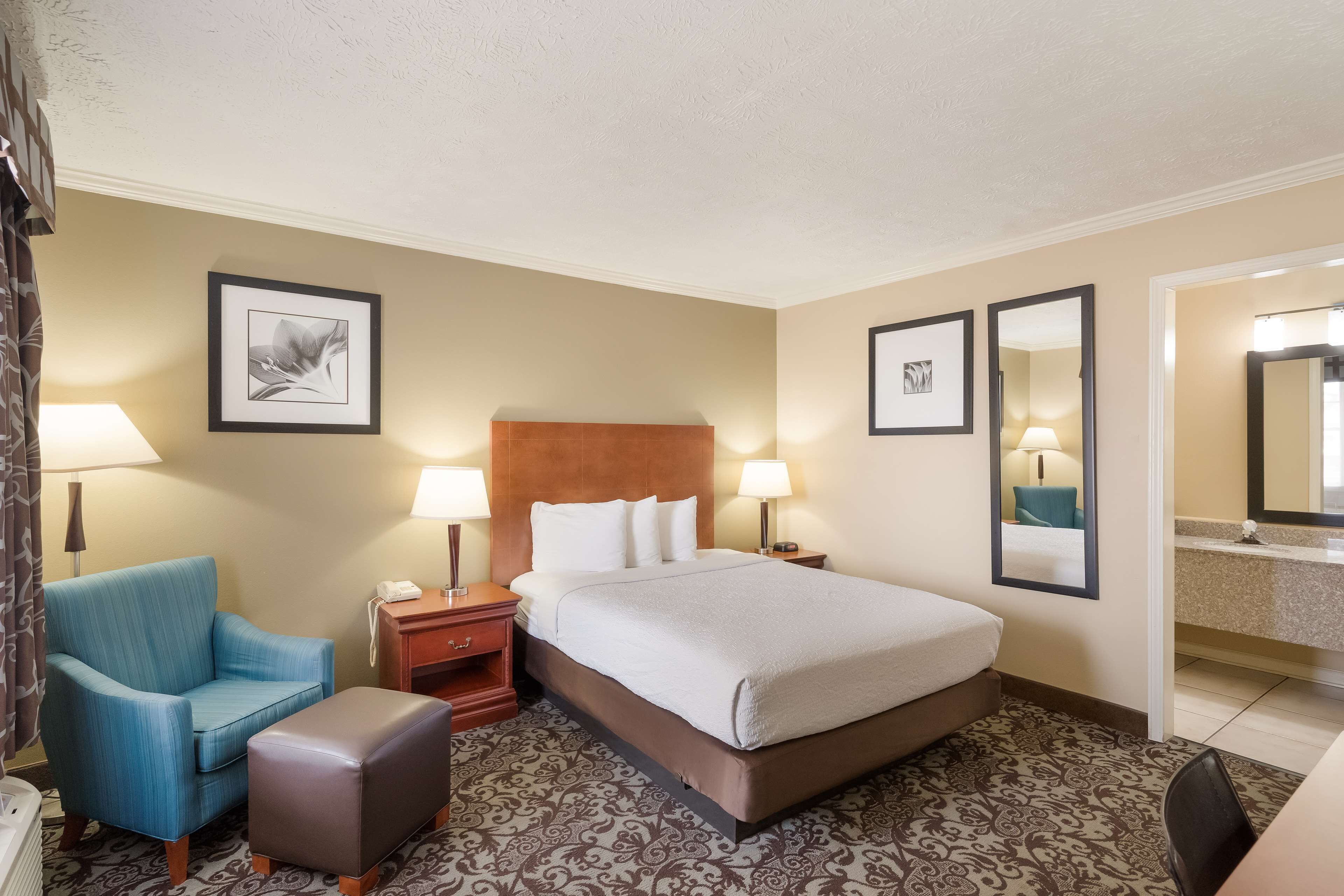 standard room, 1 queen bed, non smoking, refrigerator & microwave | in-room safe, desk, laptop workspace, iron/ironing board