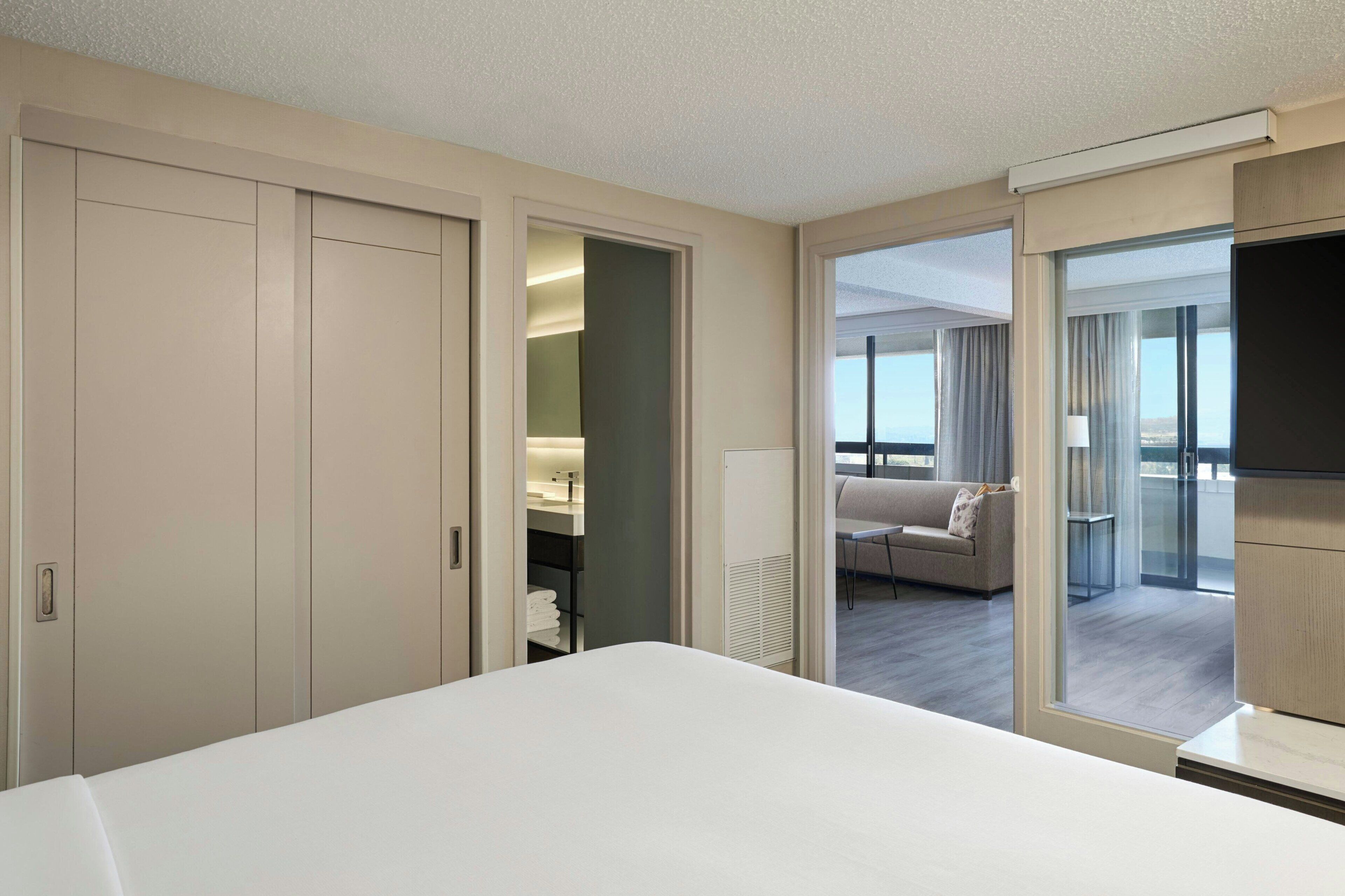 Premium bedding, down comforters, pillowtop beds, in-room safe