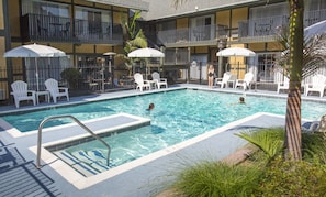 Outdoor pool, open 8:00 AM to 10:00 PM, pool umbrellas