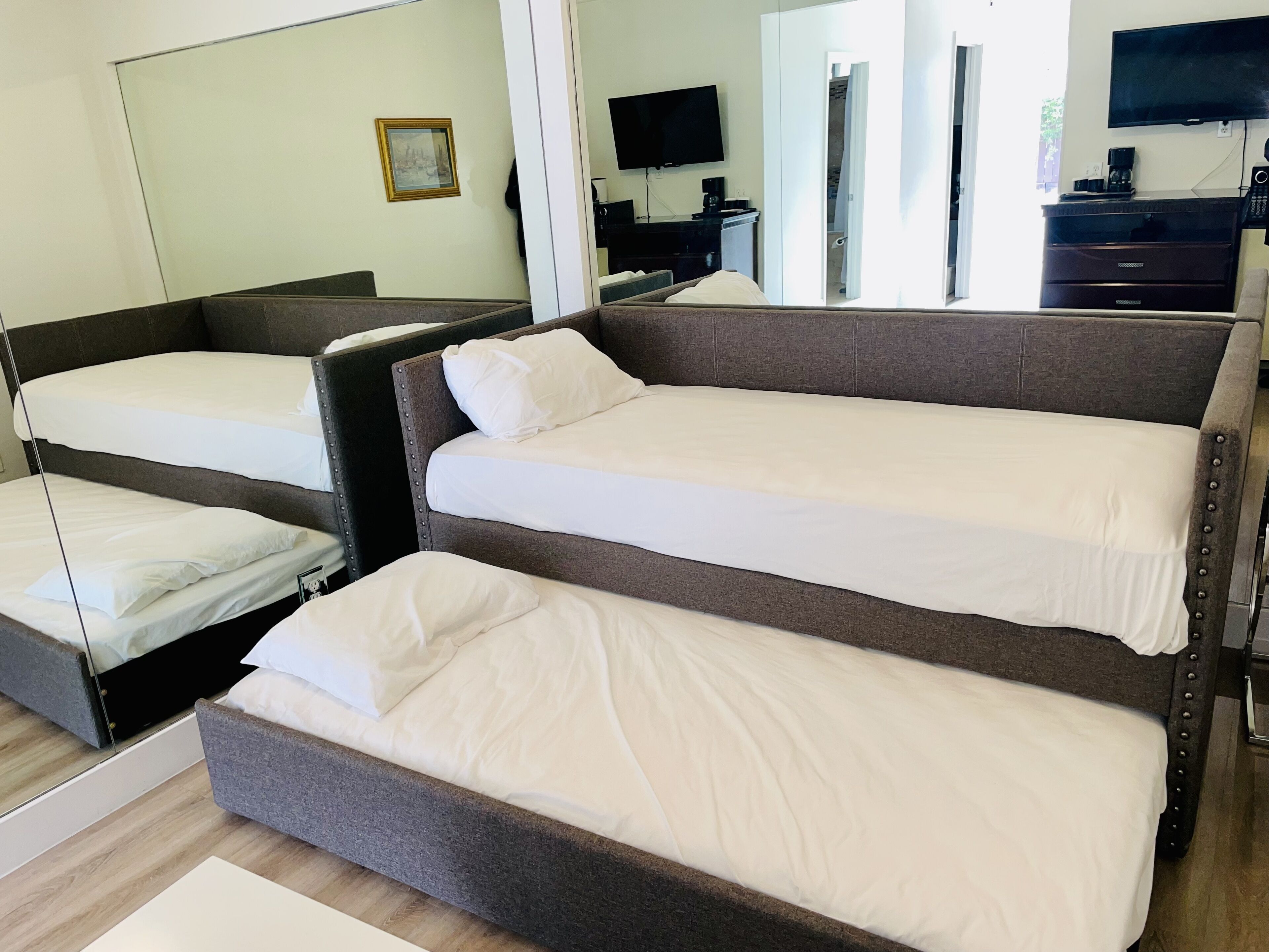 junior suite, 1 king bed with sofa bed | living area | 42-inch lcd tv with cable channels, tv, dvd player