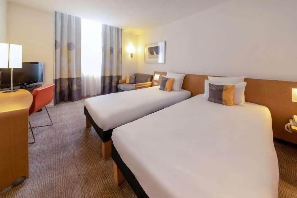 Hypo-allergenic bedding, down duvets, memory-foam beds, minibar