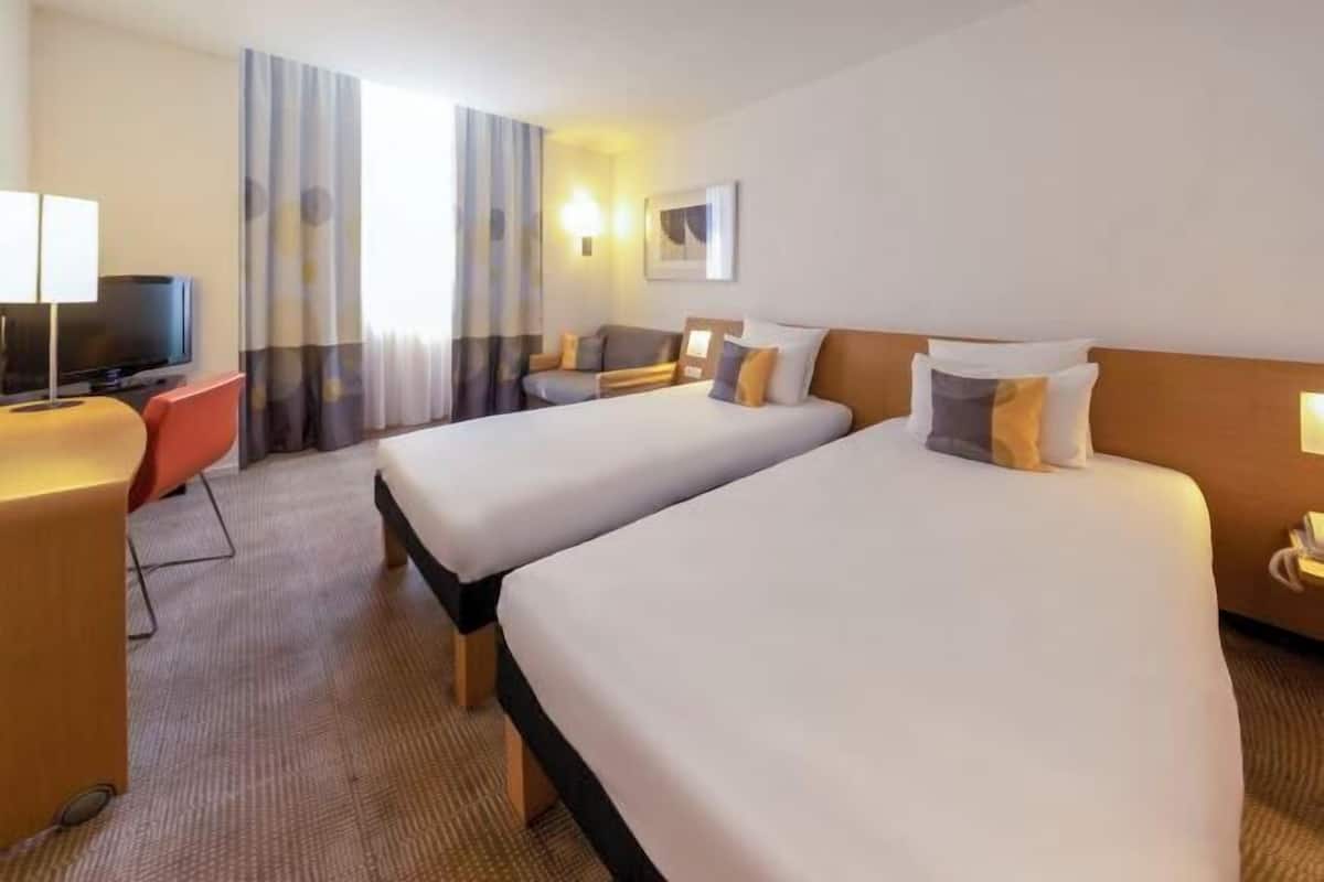 Hypo-allergenic bedding, down duvets, memory-foam beds, minibar