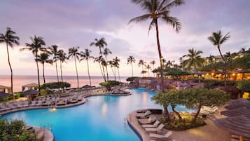6 outdoor pools, cabanas (surcharge), pool umbrellas