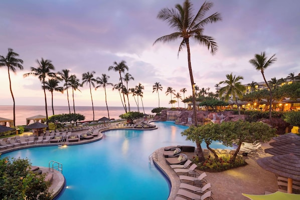 6 outdoor pools, cabanas (surcharge), pool umbrellas
