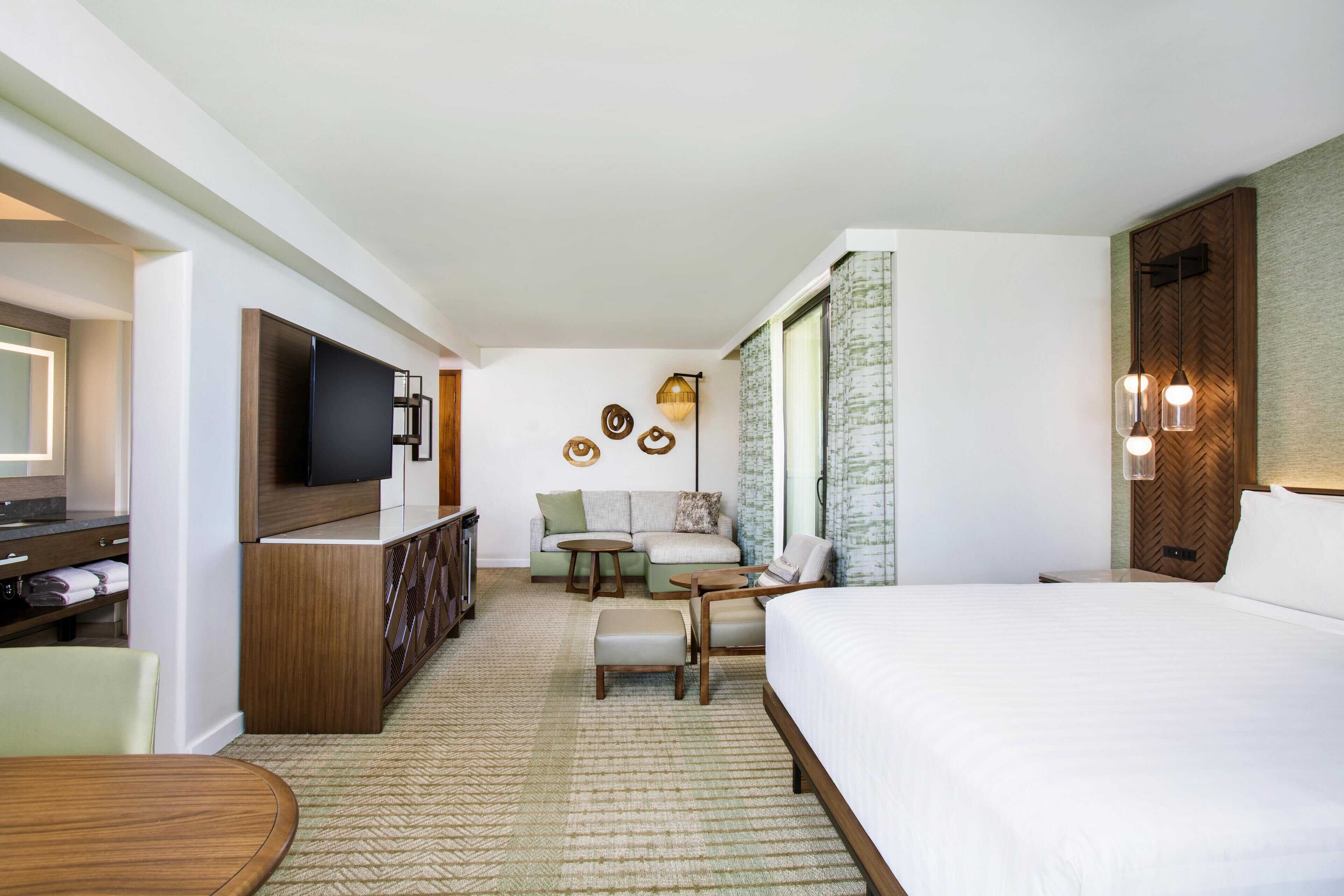 Chambre, 1 très grand lit et 1 canapé-lit, vue océan, en angle