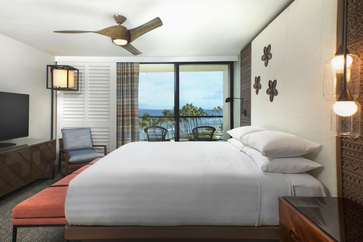 Deluxe Suite (Ocean) | Premium bedding, in-room safe, desk, laptop workspace