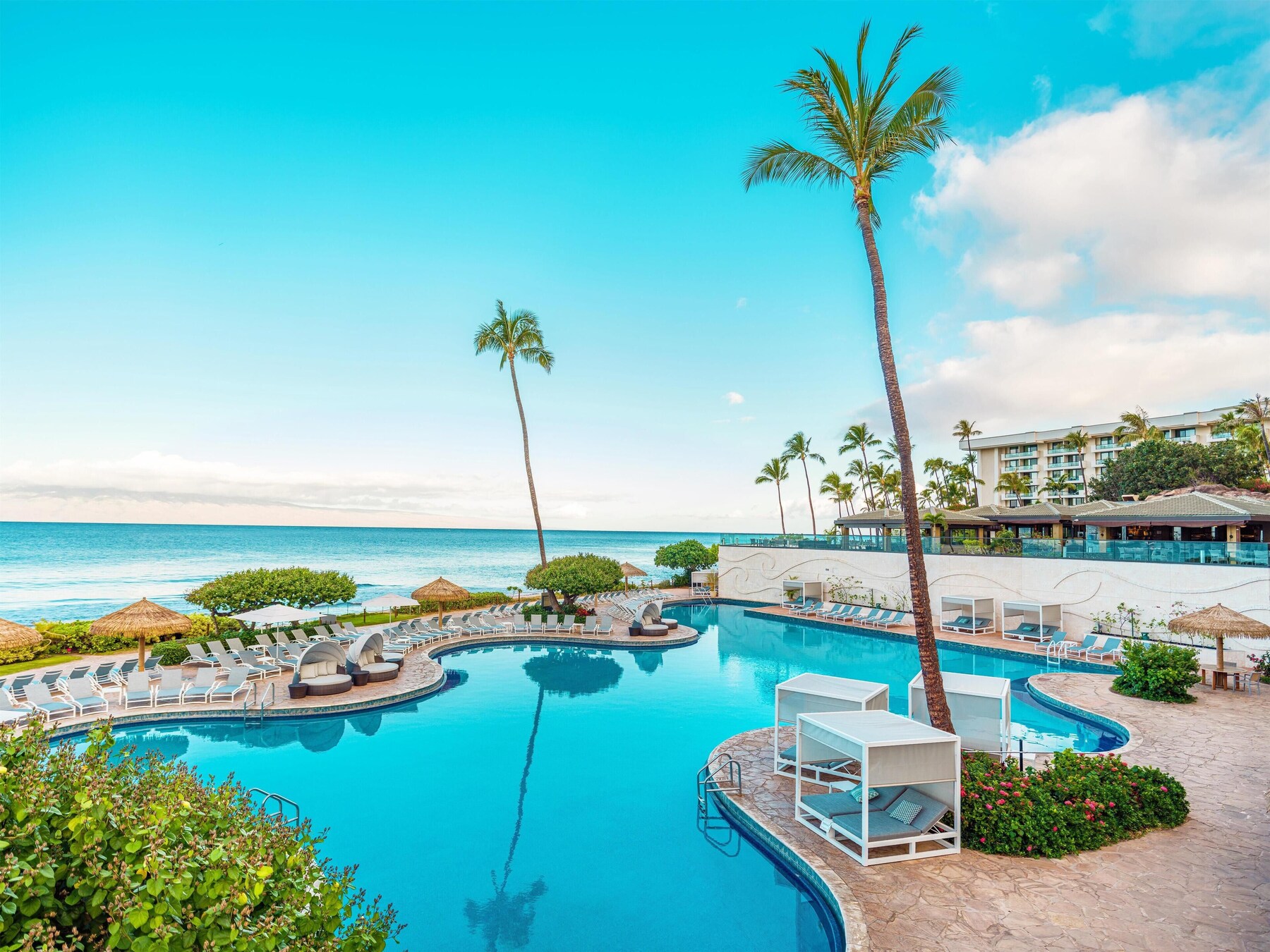 6 outdoor pools, cabanas (surcharge), pool umbrellas