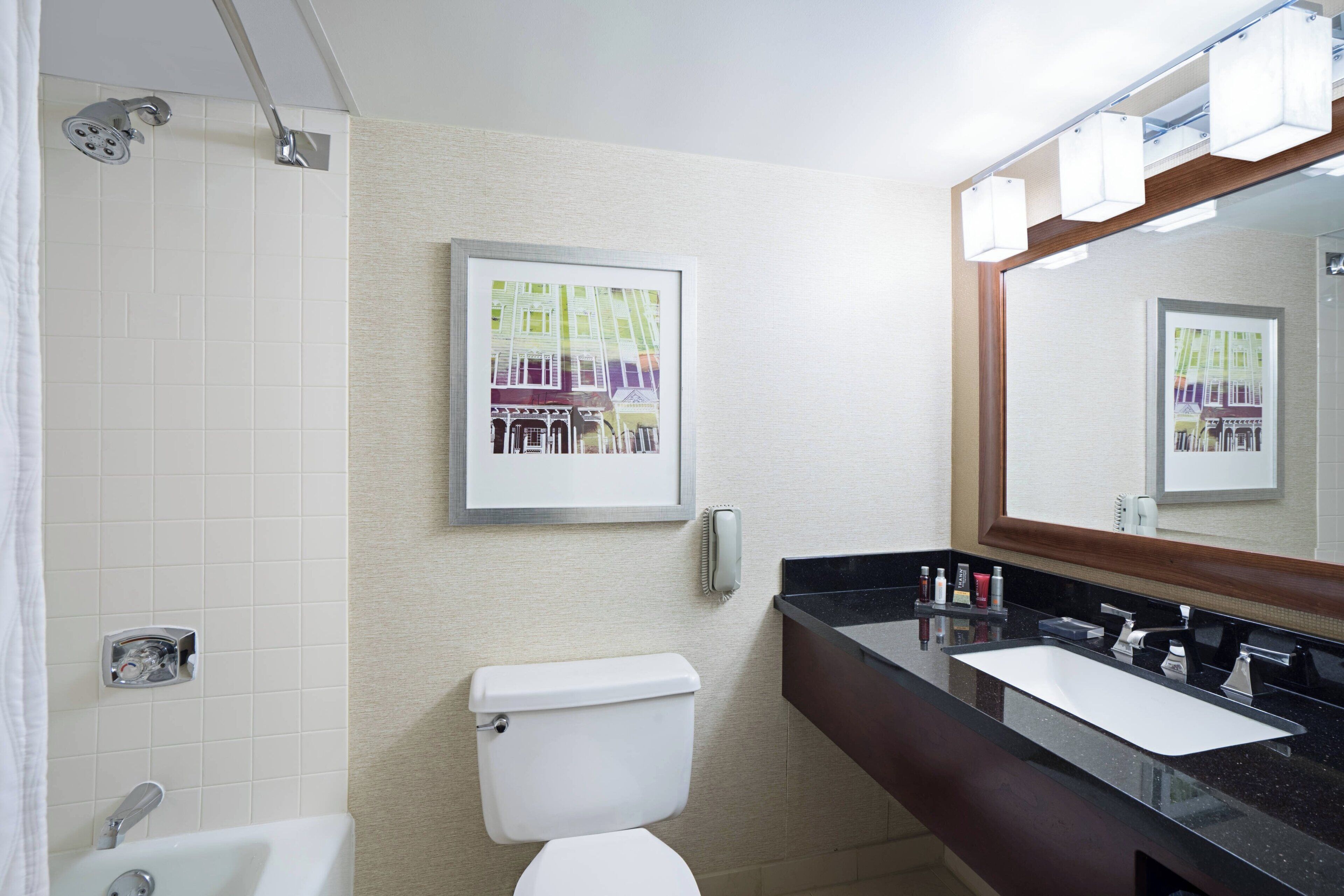 combined shower/bathtub, deep-soaking bathtub, free toiletries