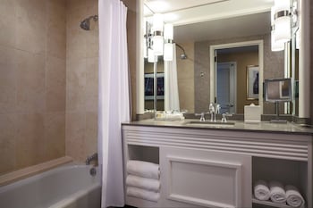 Combined shower/tub, designer toiletries, hair dryer, towels at Renaissance Chicago Downtown Hotel