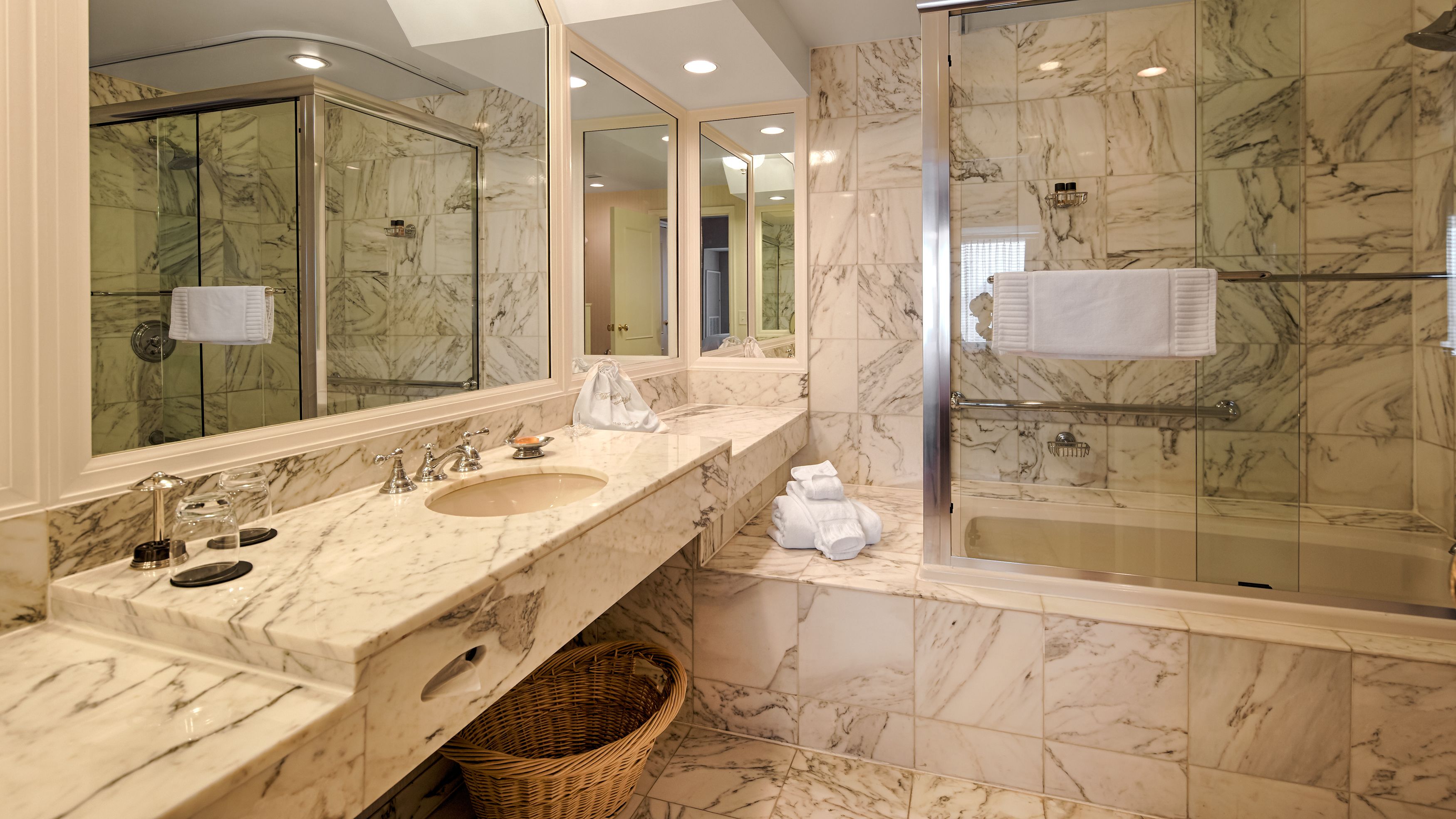 luxury suite, 1 king bed | bathroom | combined shower/bathtub, designer toiletries, hair dryer, bathrobes