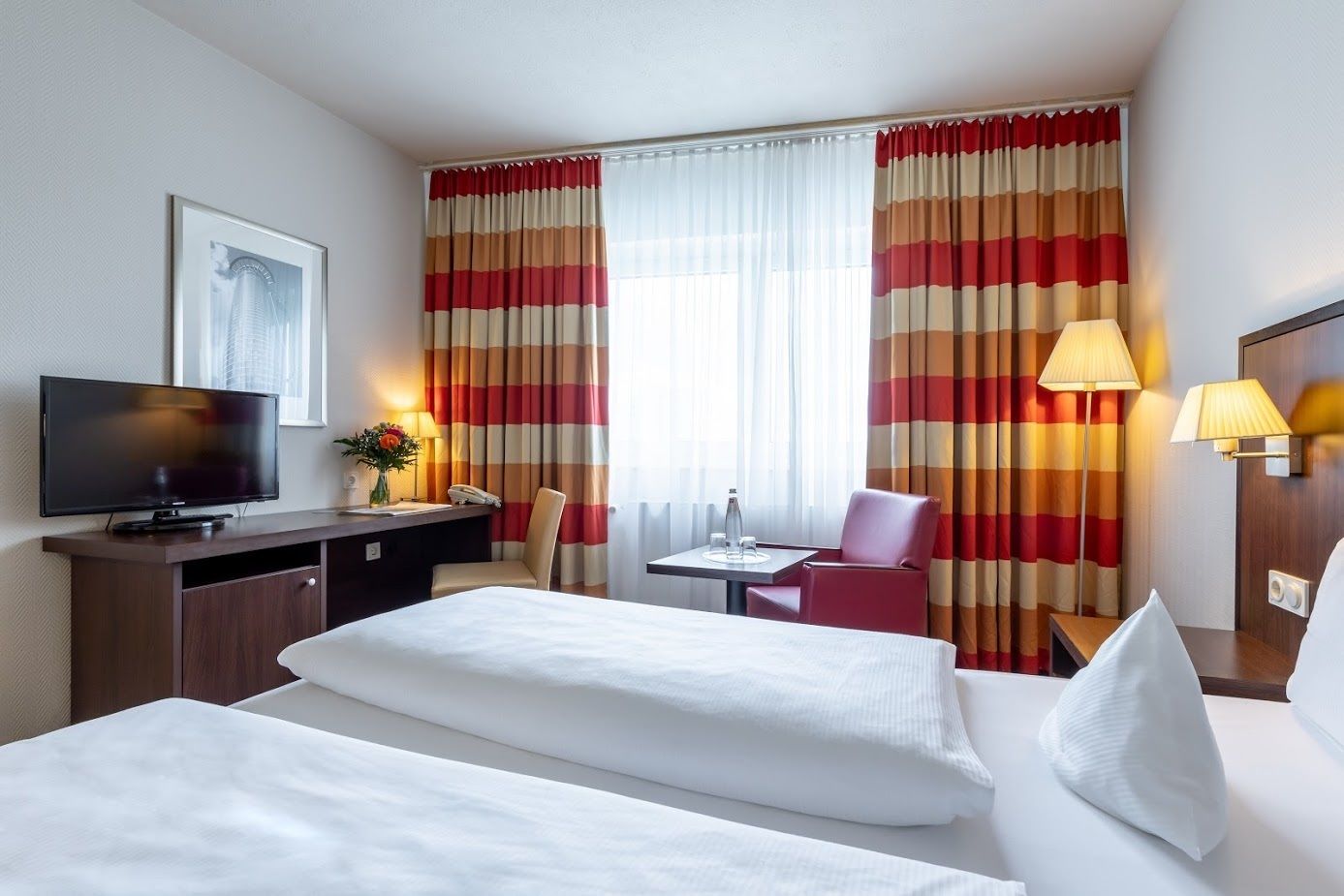 Queen Plus Room | Hypo-allergenic bedding, desk, blackout drapes, soundproofing