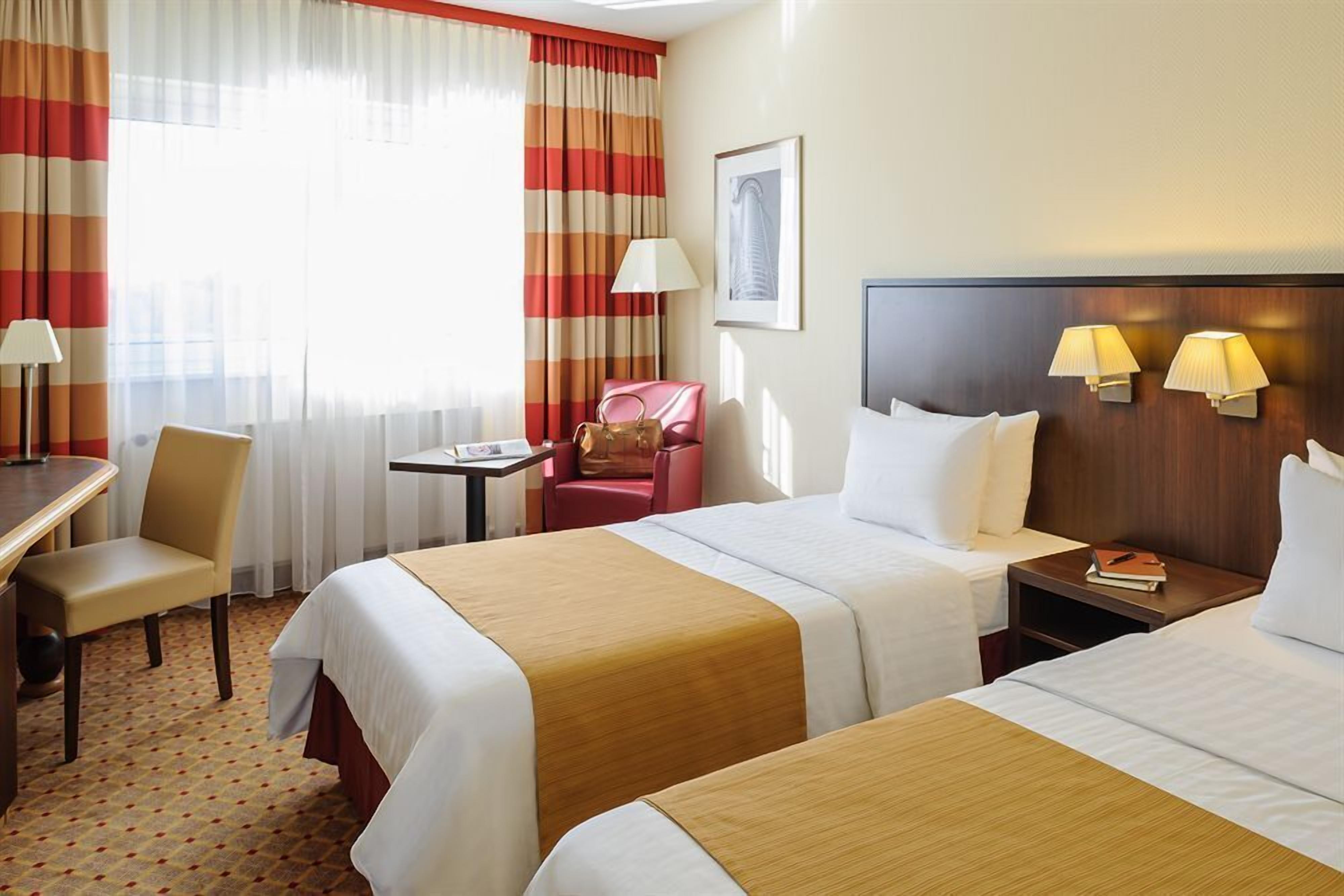 Hypo-allergenic bedding, desk, blackout drapes, soundproofing