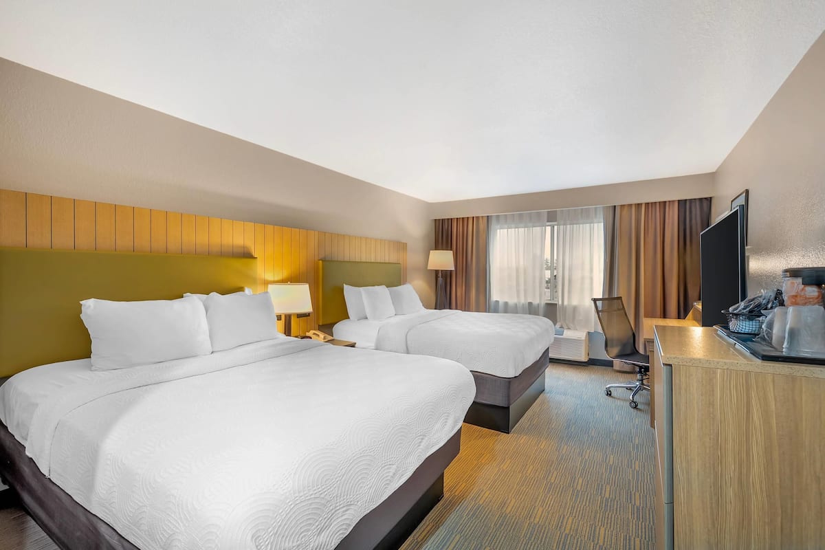 Room, 2 Queen Beds, Non Smoking | Desk, laptop workspace, blackout drapes, iron/ironing board