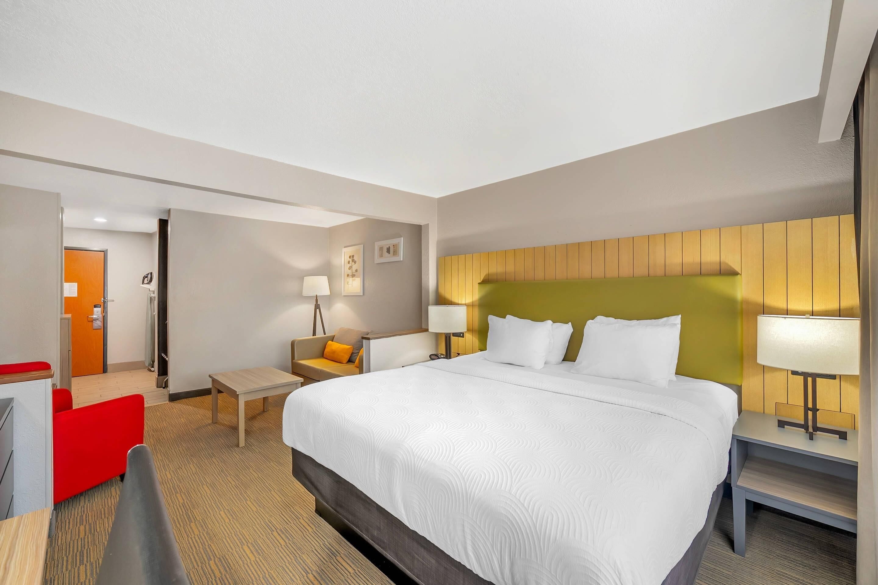 Chambre, 1 très grand lit, accessible aux personnes à mobilité réduite, non-fumeurs | Bureau, espace de travail pour ordinateur portable, rideaux occultants