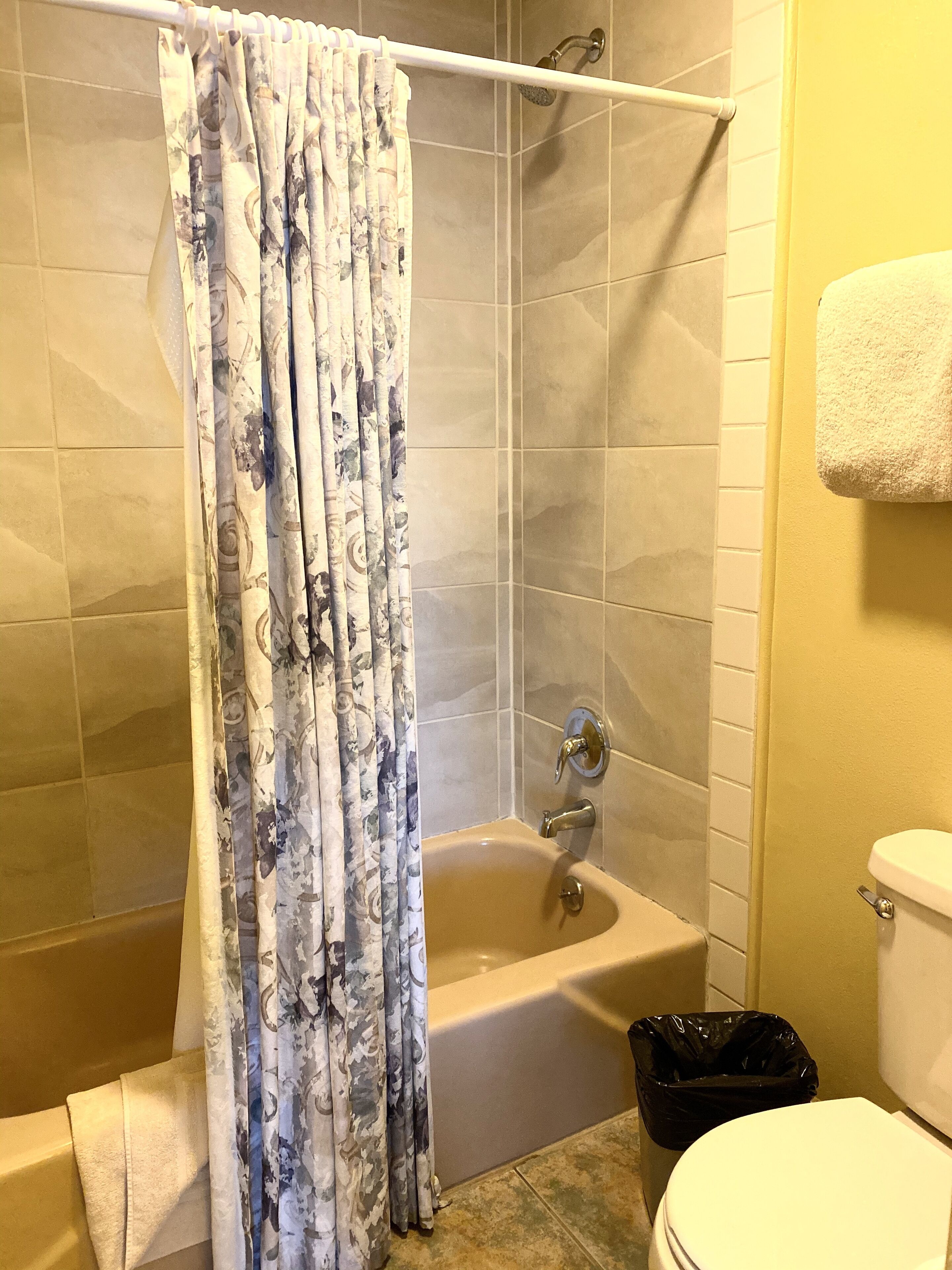 deluxe room, 2 queen beds, kitchen, lake view | bathroom | hair dryer, towels