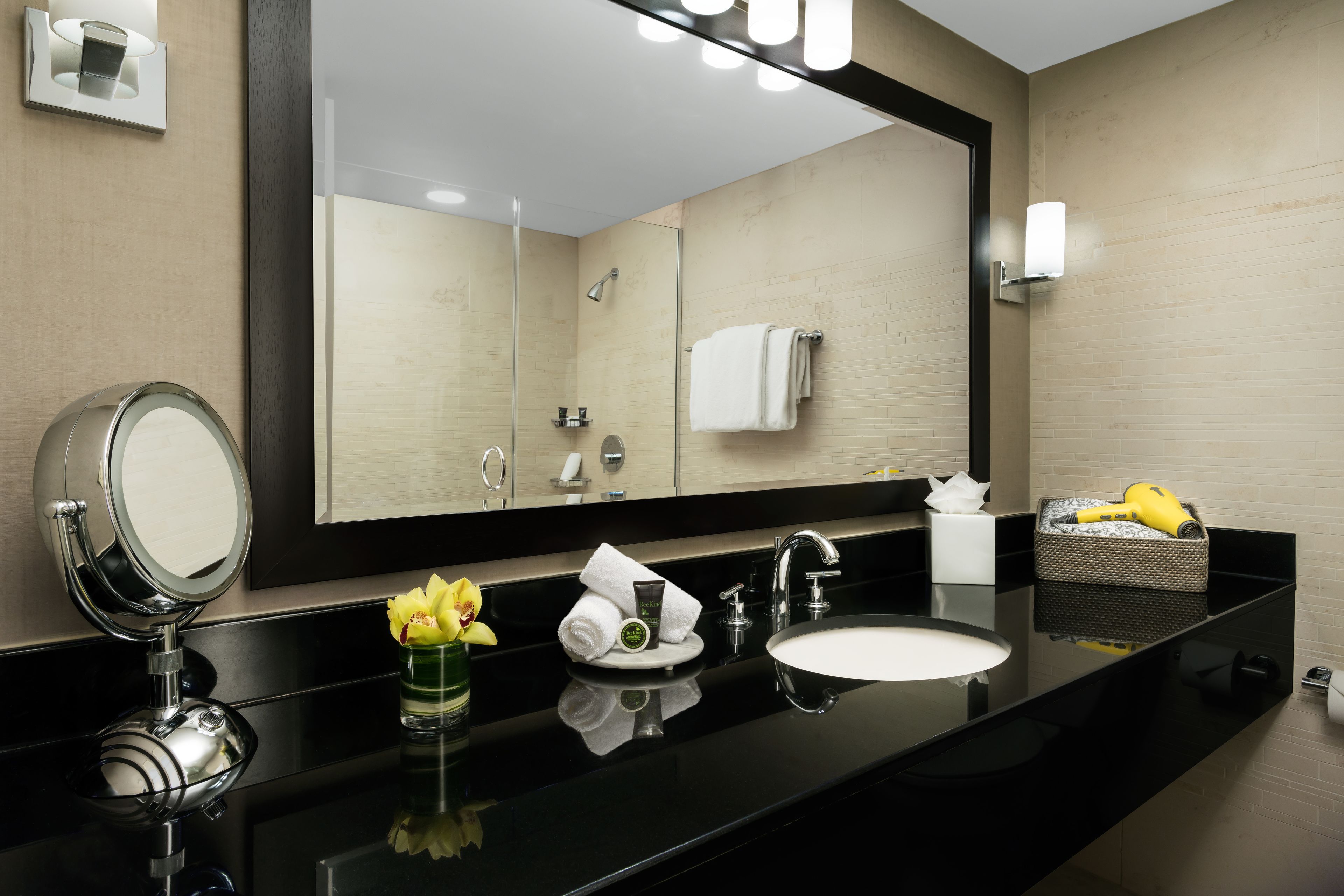 combined shower/bathtub, designer toiletries, hair dryer, bathrobes