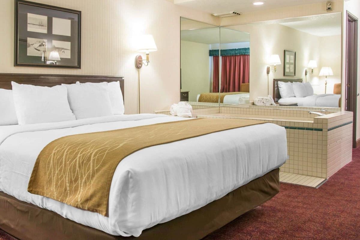 Chambre Deluxe, 1 trÚs grand lit, non-fumeurs (Whirlpool In Bath) | Literie de qualité supérieure, bureau, chambres insonorisées