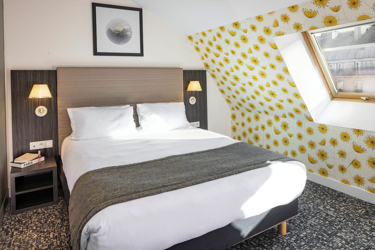 Suite, 1 Queen Bed (Living Area) | Minibar, in-room safe, individually decorated, individually furnished