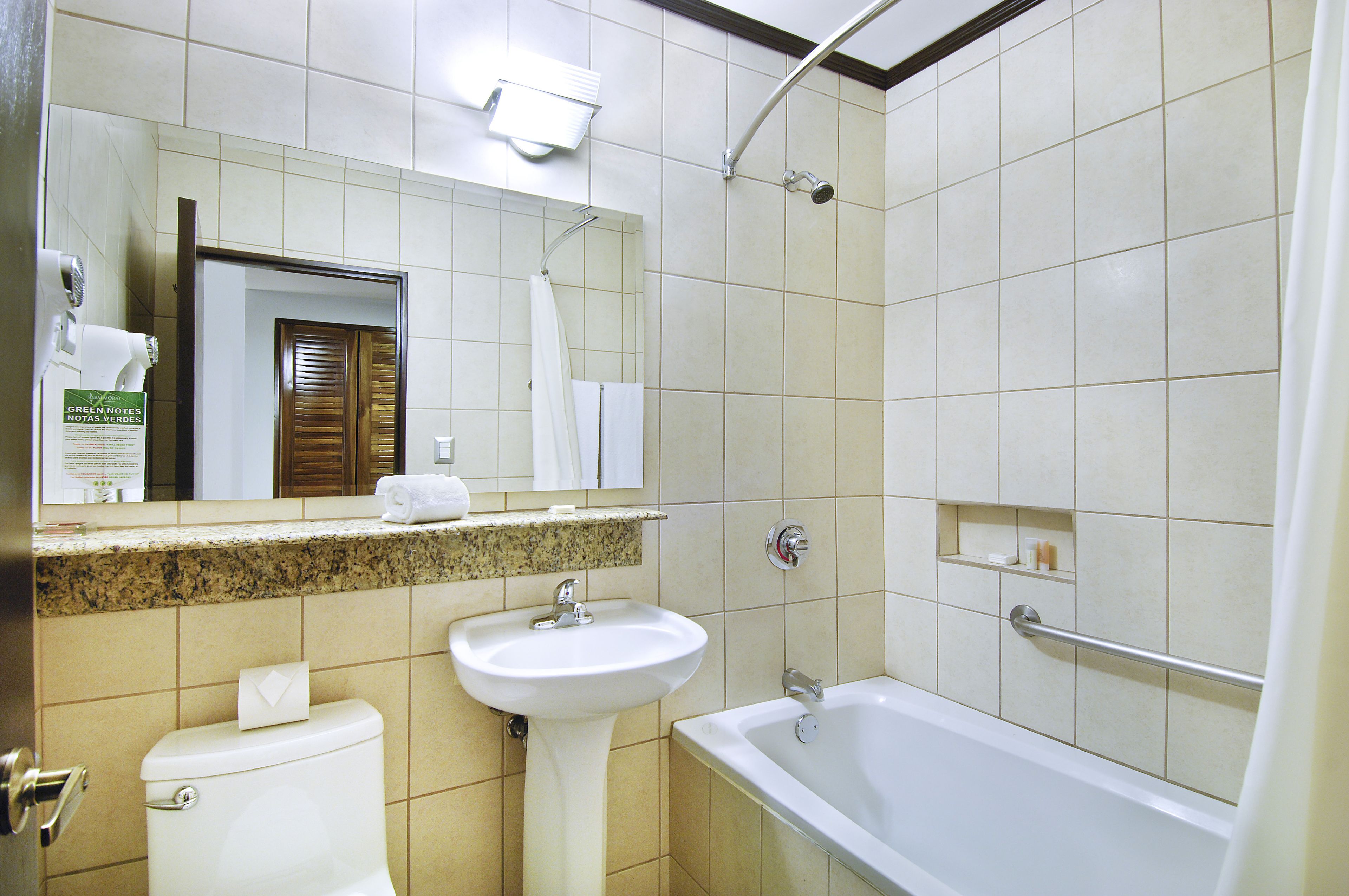 deluxe | bathroom | hair dryer, towels