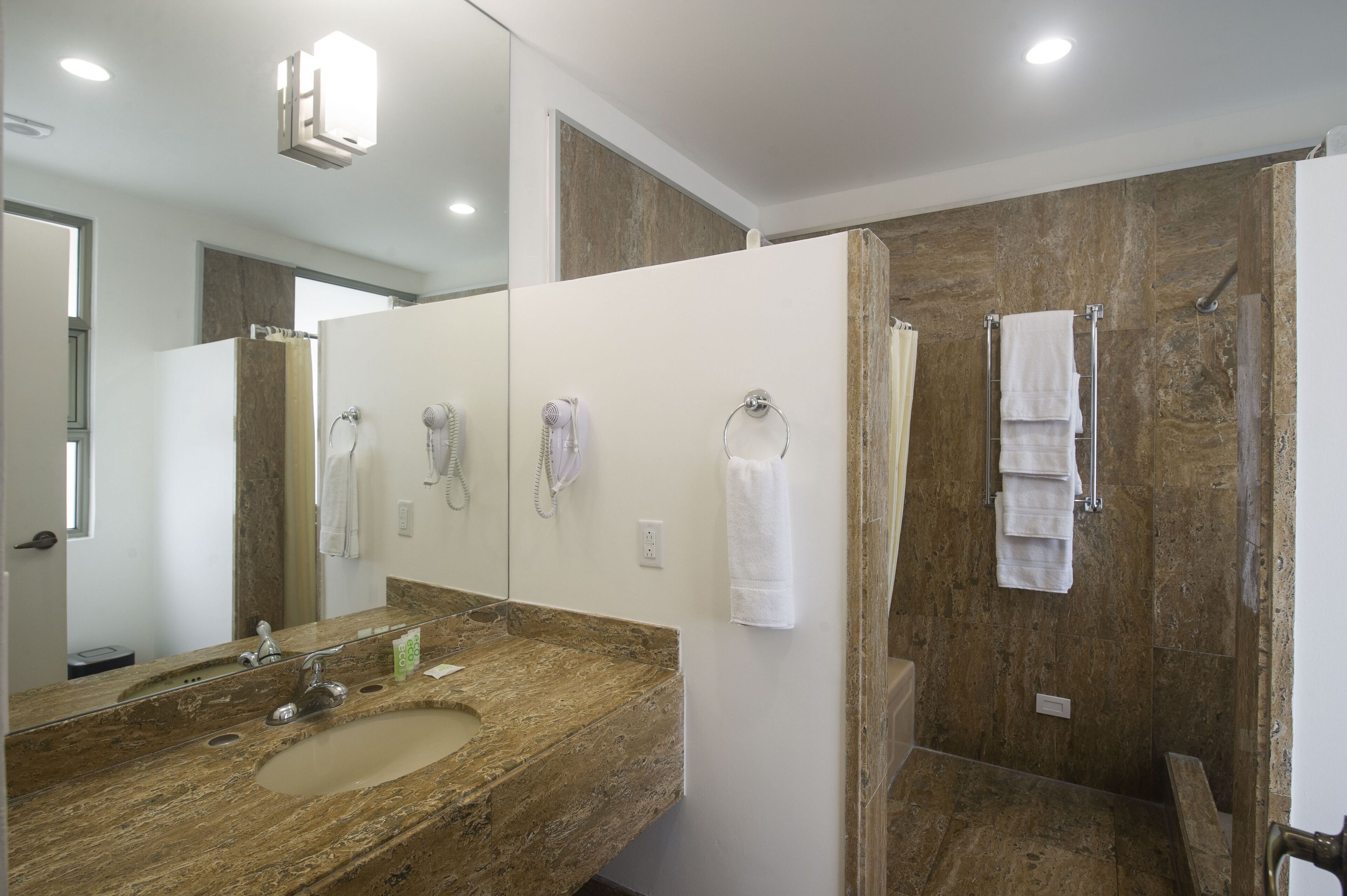 suite 514 | bathroom | hair dryer, towels