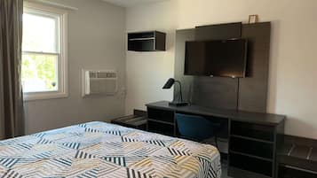 Desk, laptop workspace, free WiFi, bed sheets