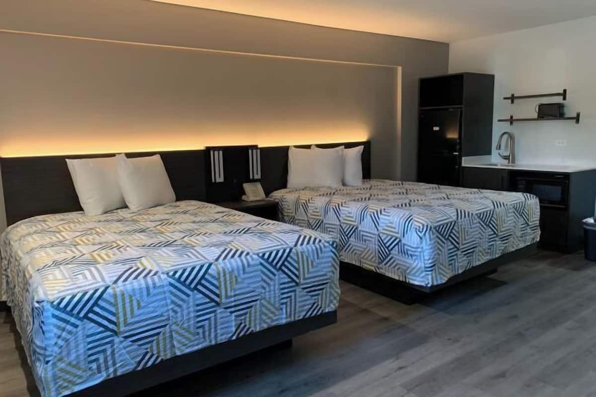 Desk, laptop workspace, free WiFi, bed sheets