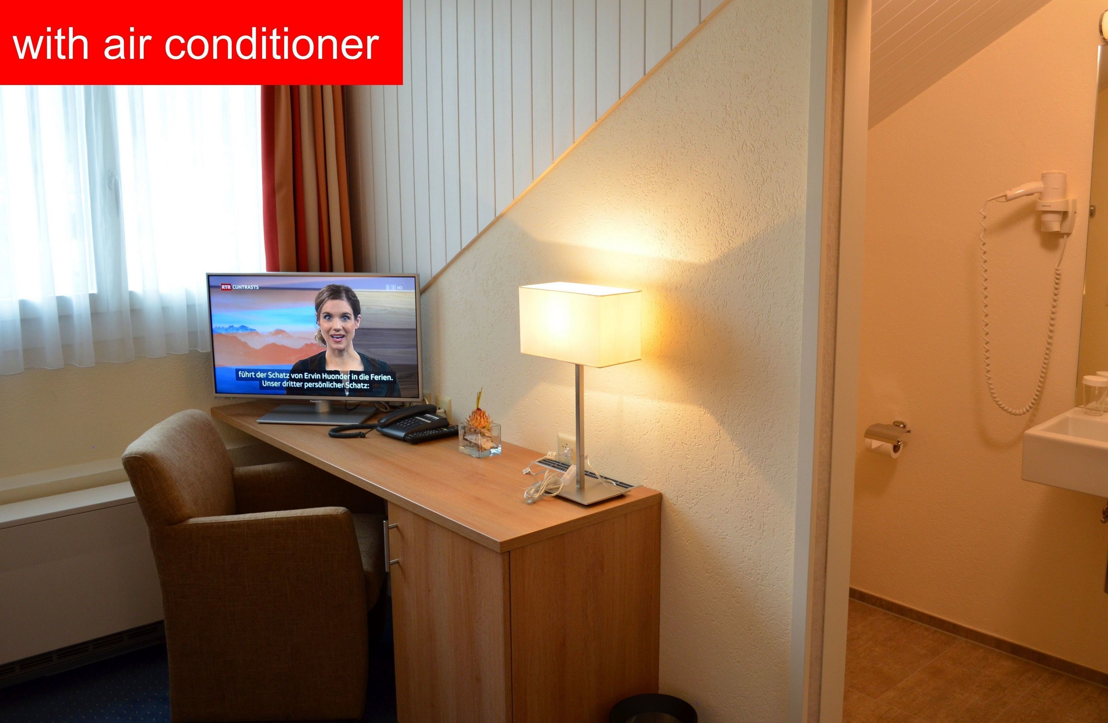 standard single room | in-room safe, desk, blackout curtains, iron/ironing board