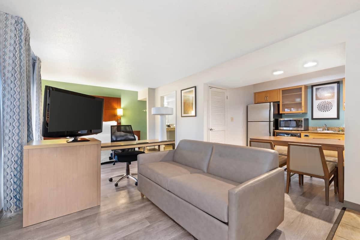 Desk, laptop workspace, blackout curtains, iron/ironing board