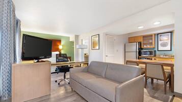 Desk, laptop workspace, blackout curtains, iron/ironing board