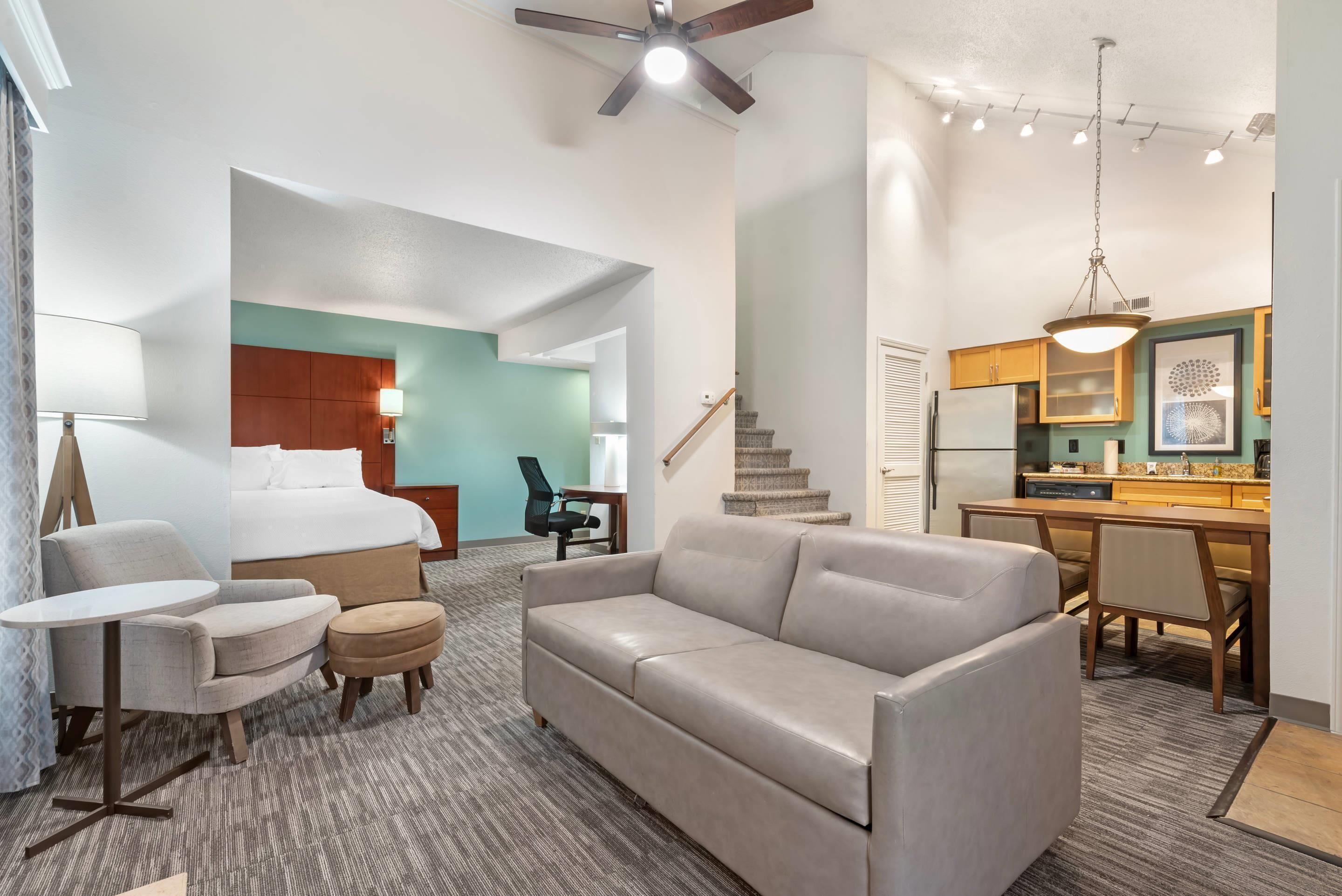 Desk, laptop workspace, blackout drapes, iron/ironing board