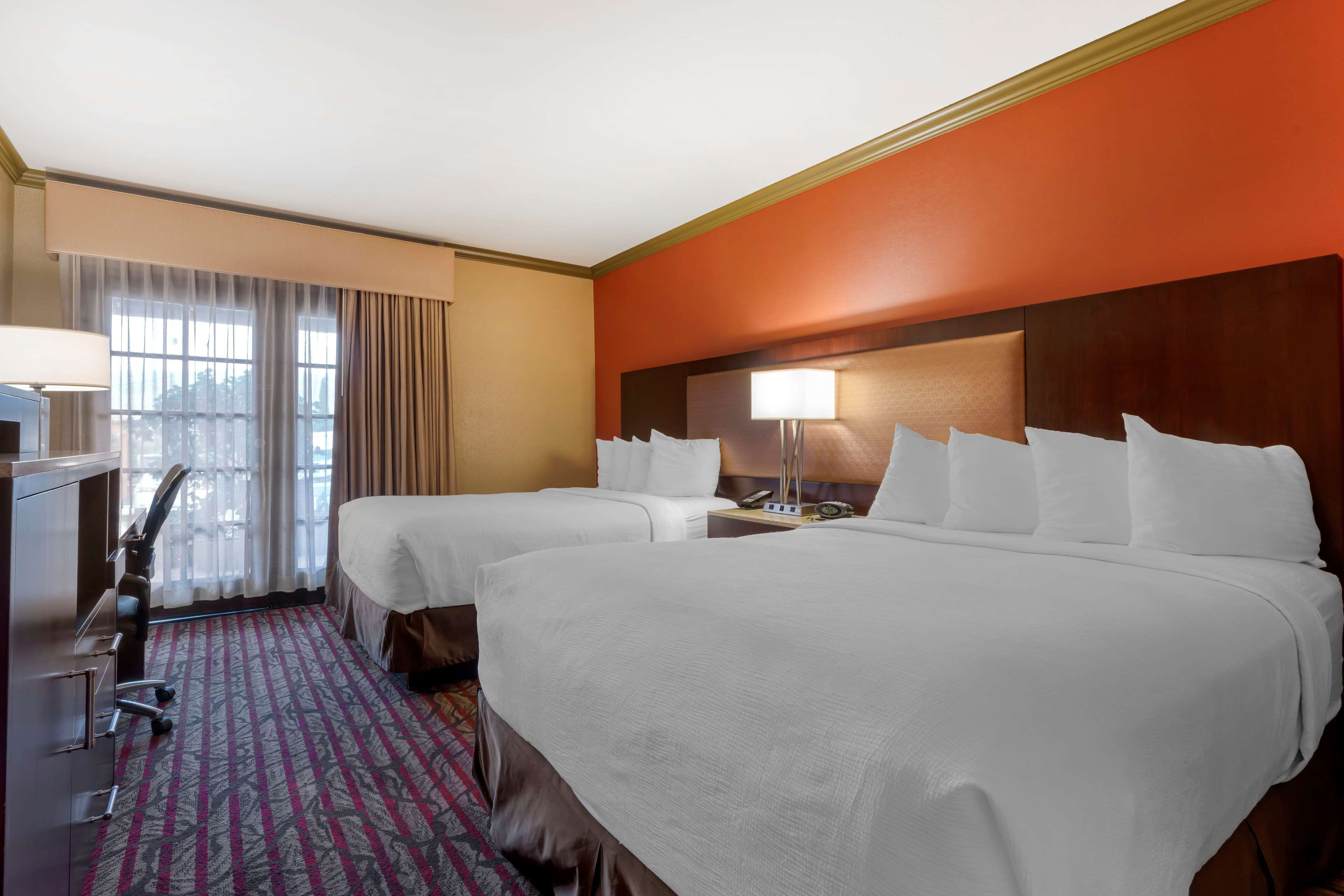 standard room, 2 queen beds, non smoking, refrigerator & microwave | premium bedding, desk, laptop workspace, iron/ironing board