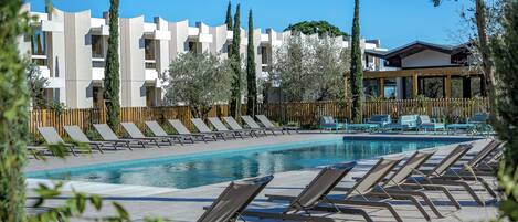 Seasonal outdoor pool, open 8:00 AM to 8:00 PM, sun loungers