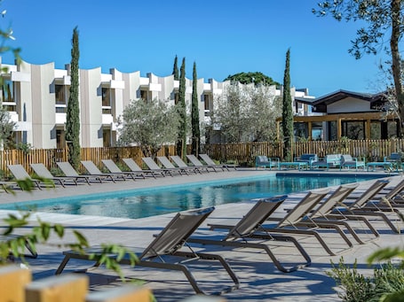 Seasonal outdoor pool, open 8:00 AM to 8:00 PM, sun loungers