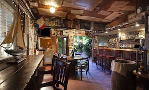 2 bars/lounges, poolside bar, beach bar
