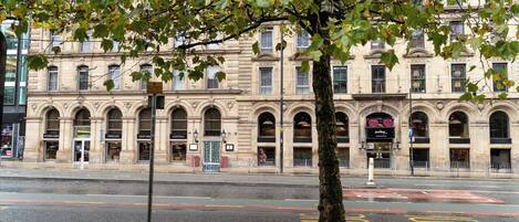 A historic building with arched windows and a classic facade.
