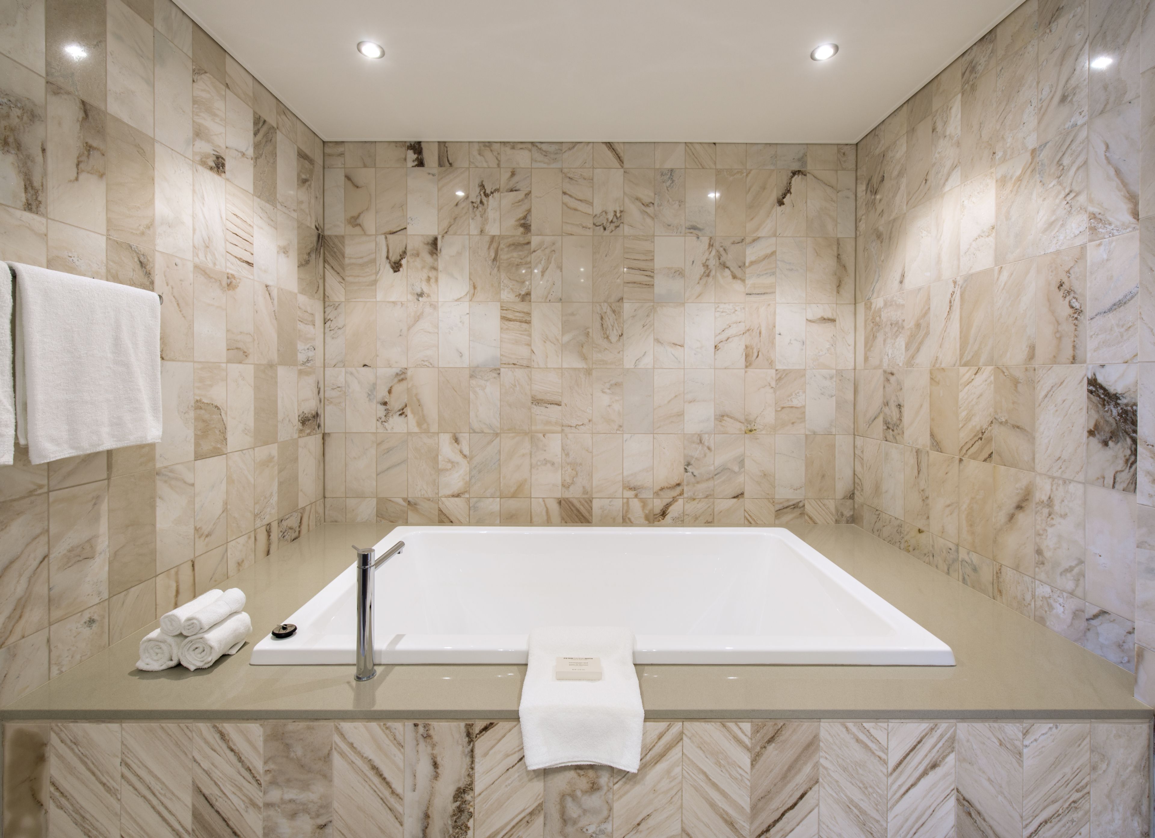 king premier suite | bathroom | shower, free toiletries, hair dryer, towels
