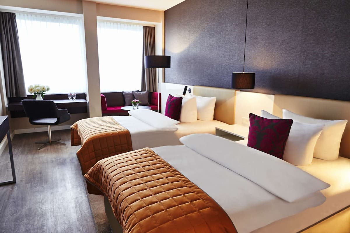 Hypo-allergenic bedding, in-room safe, desk, laptop workspace