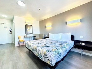 Desk, laptop workspace, free WiFi, bed sheets