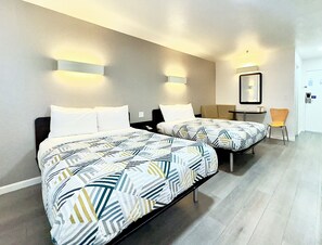 Desk, laptop workspace, free WiFi, bed sheets