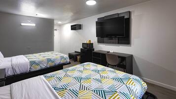 Desk, laptop workspace, free WiFi, bed sheets