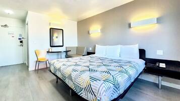 Desk, laptop workspace, free WiFi, bed sheets