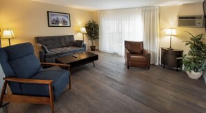 Superior Studio Suite, 1 King Bed with Sofa bed, Kitchen, Ground Floor | Living area | Flat-screen TV