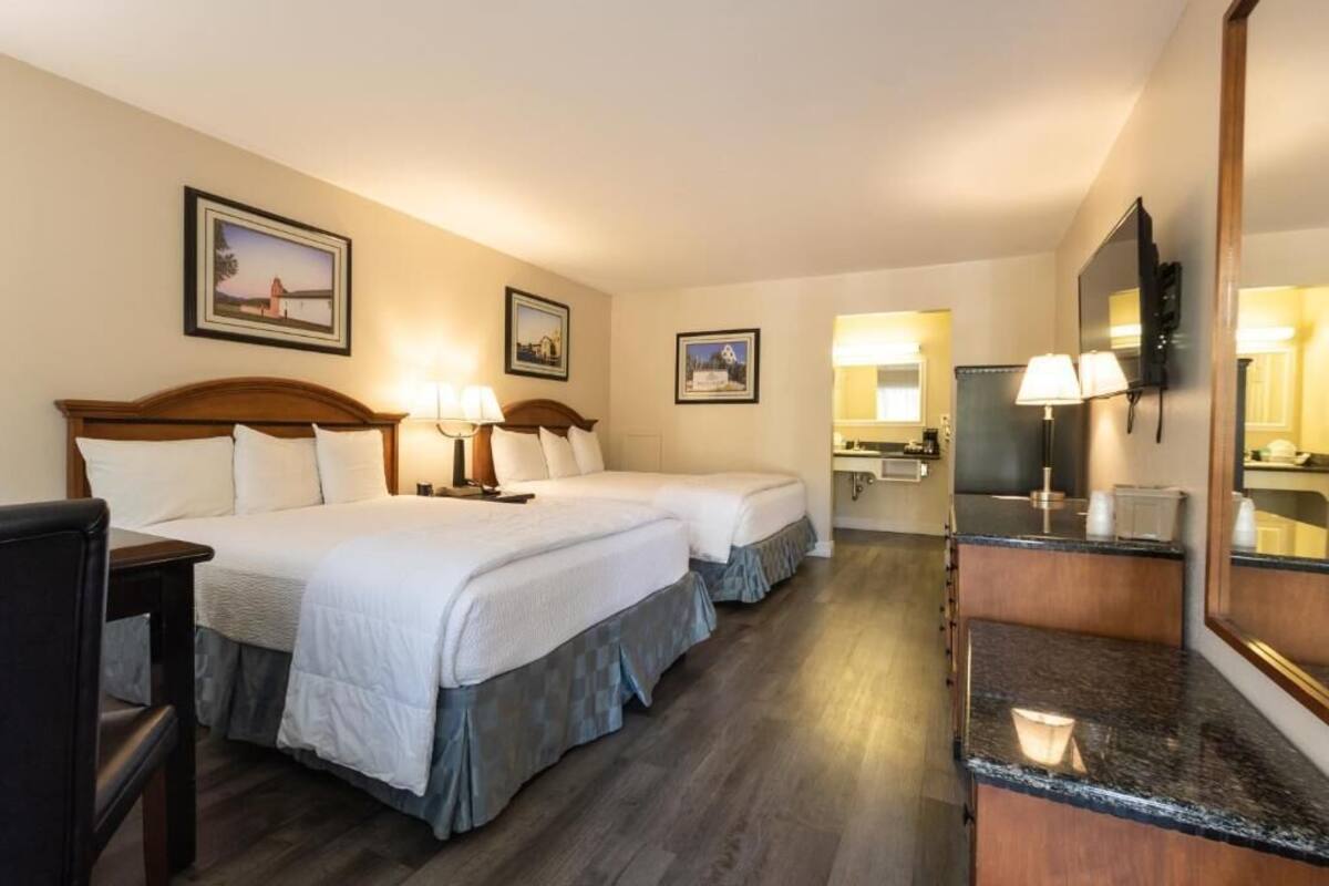 Standard Room, 2 Queen Beds, Ground Floor | Desk, laptop workspace, iron/ironing board, WiFi (free)
