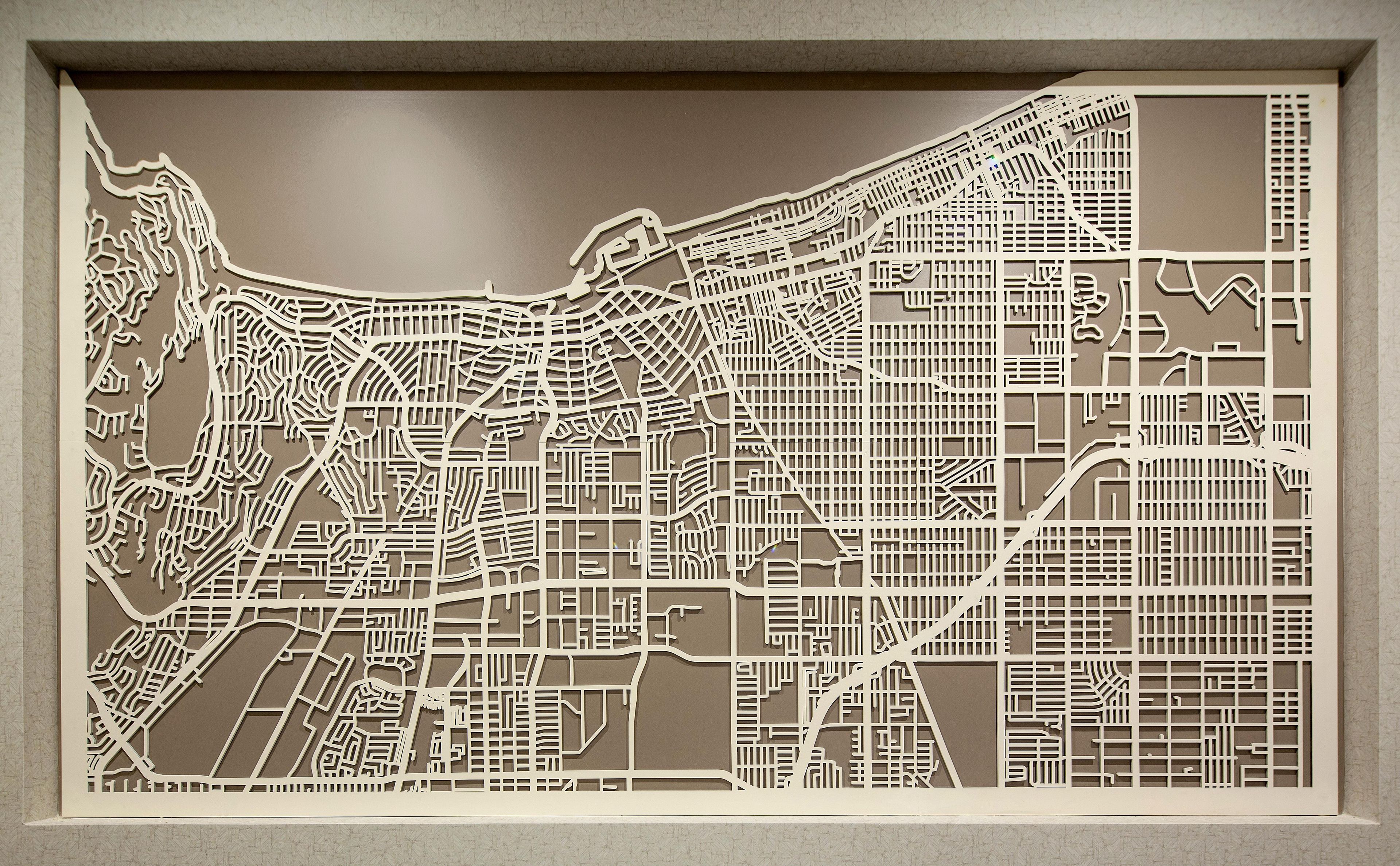 A detailed cut-out map of a city with various streets and blocks.