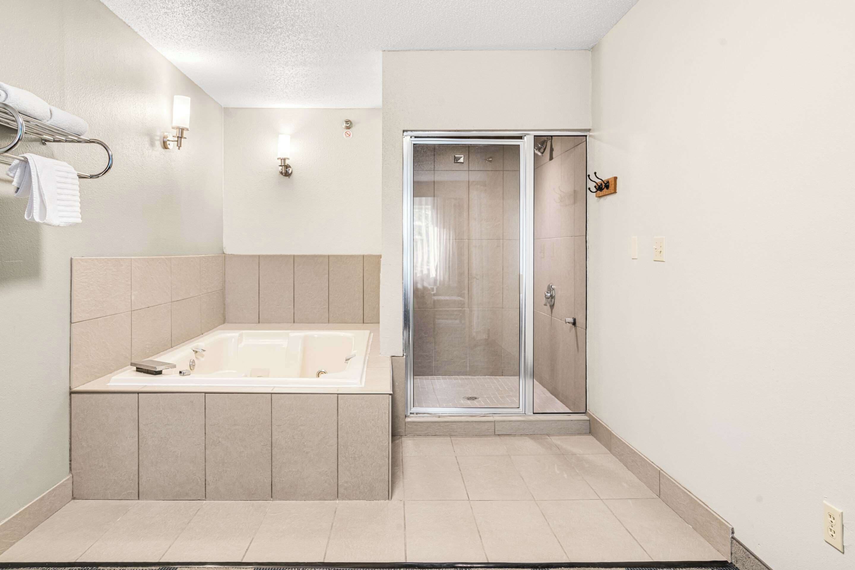 suite, 1 king bed, non smoking (extended stay) | premium bedding, desk, laptop workspace, blackout curtains