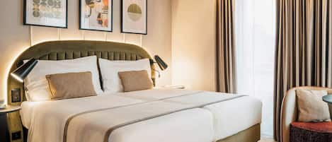 Minibar, coffre-fort, bureau, rideaux d’obscurcissement