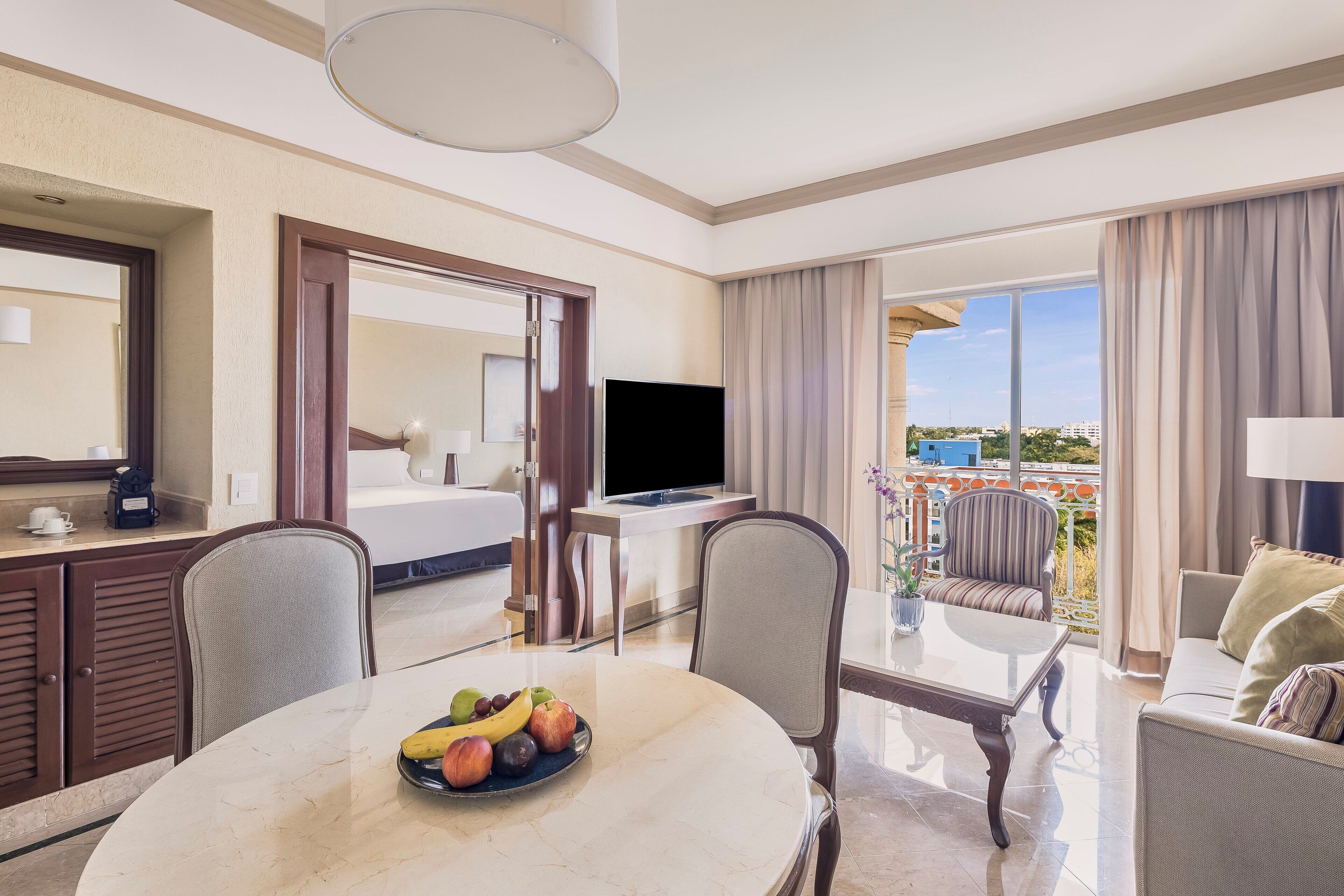 Junior Suite, 1 King Bed | Living area | 55-inch Smart TV with satellite channels, TV