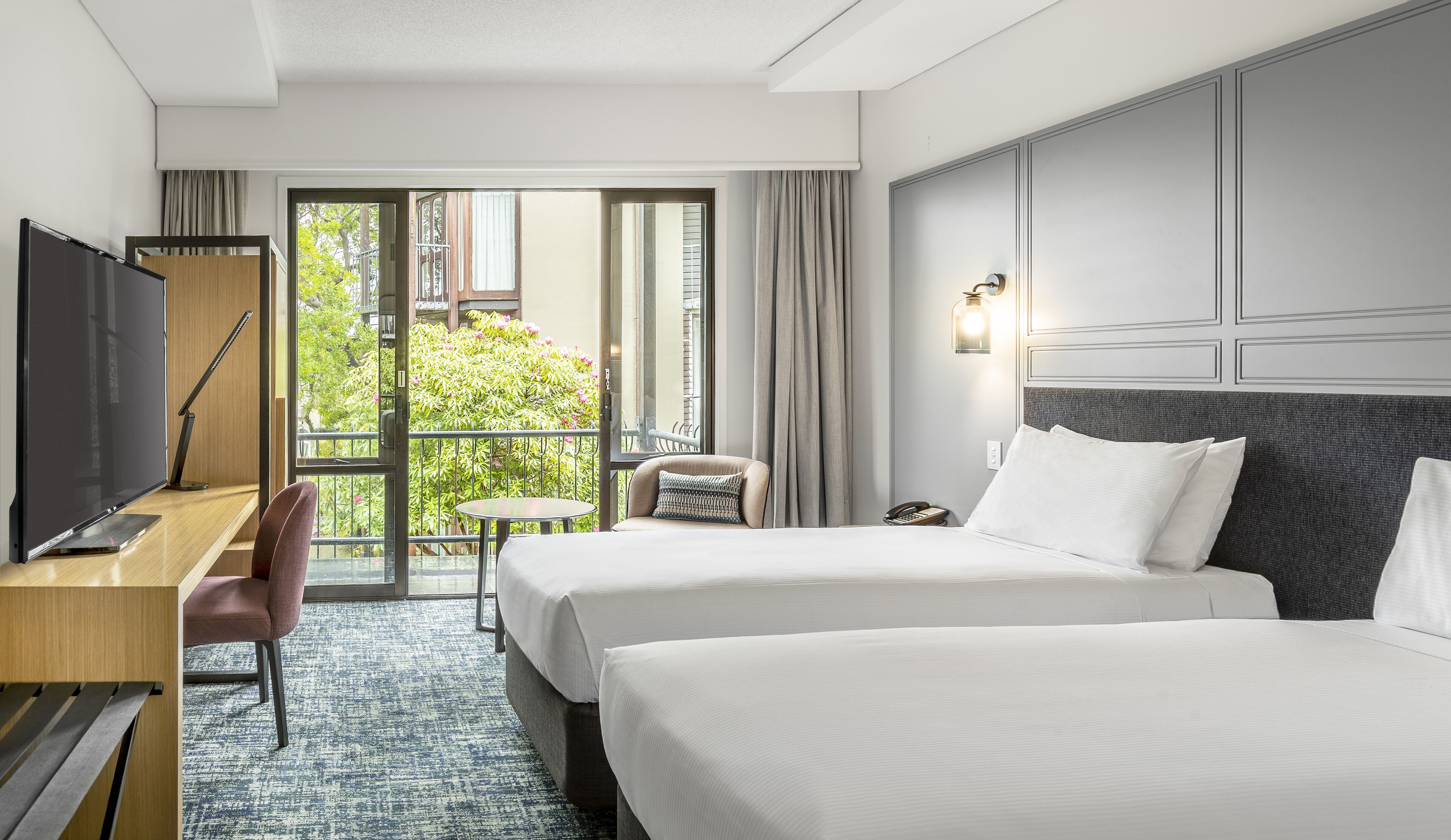 deluxe twin room, balcony | down duvets, in-room safe, individually furnished, desk