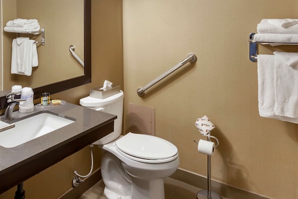 A modern bathroom with a sink, toilet, and handrails. - Best Western Plus Leamington Hotel & Conference Centre (Leamington)