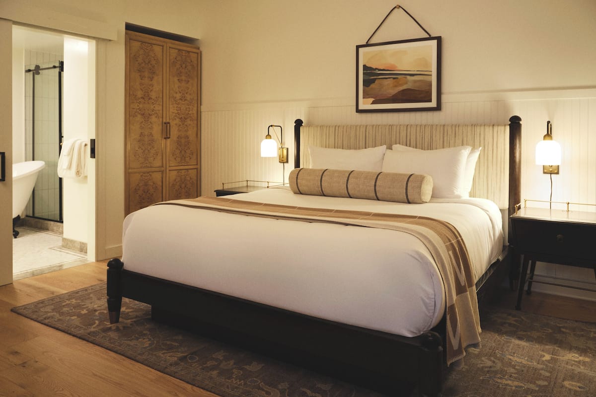 Premium bedding, down comforters, pillowtop beds, in-room safe